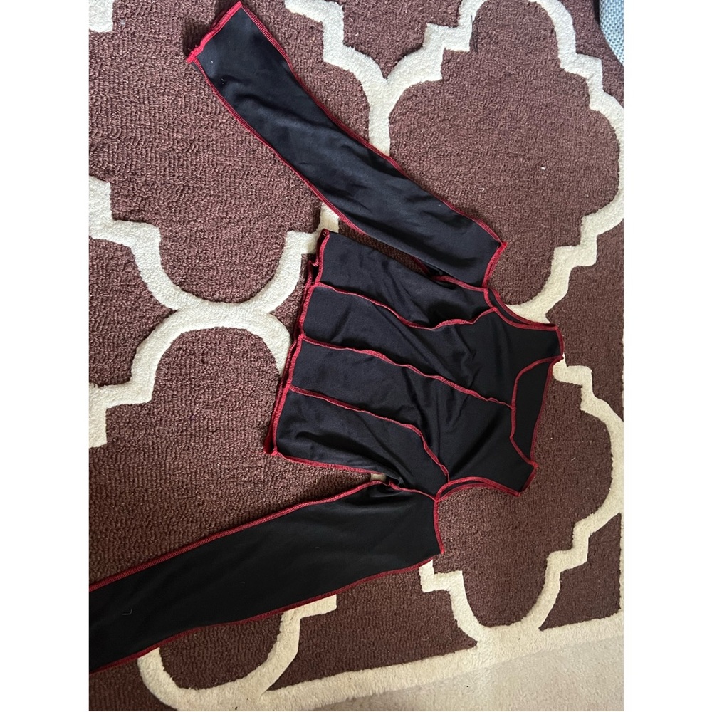black crop top with red ridged and open sholders
